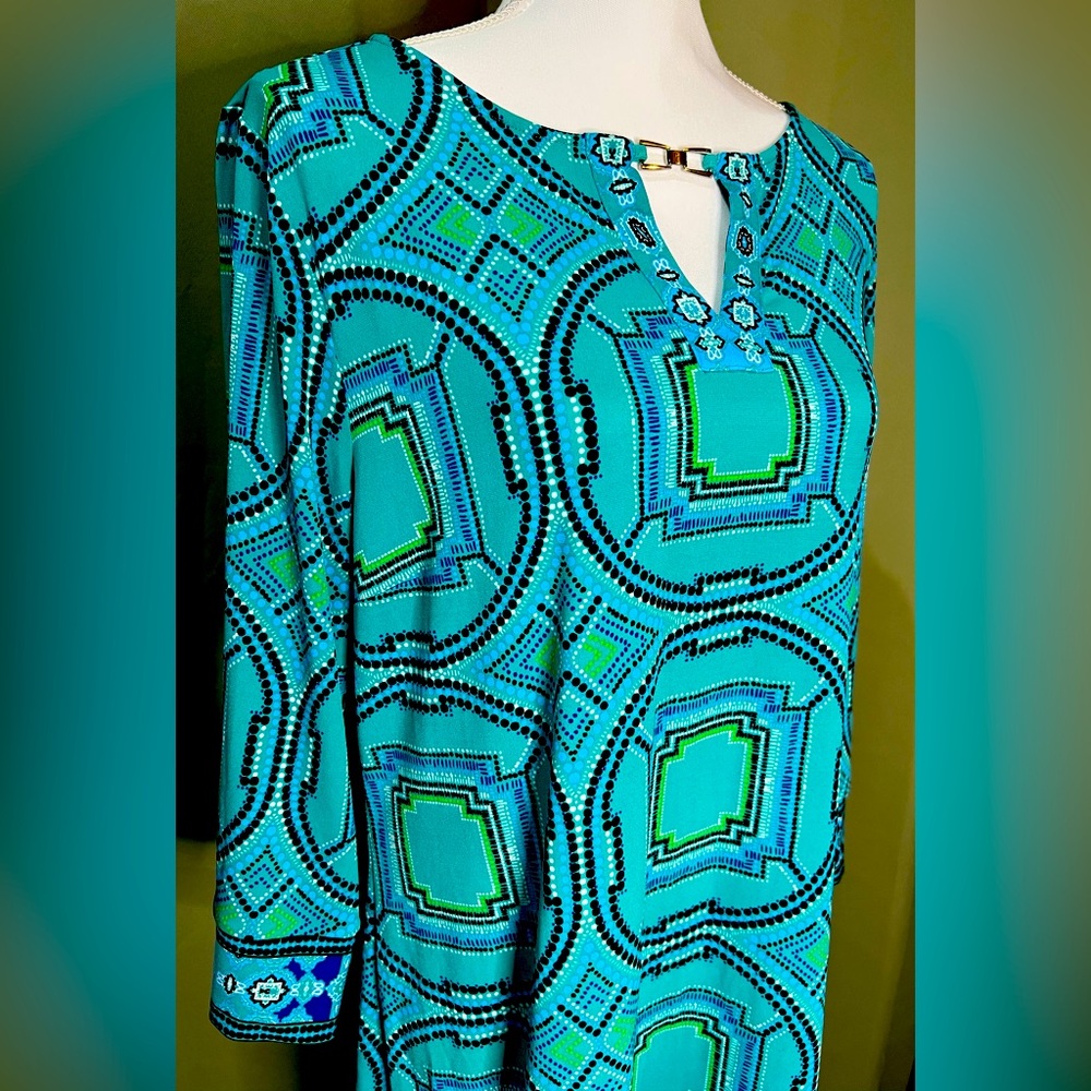 Beautiful, vibrant colored dress by Chicos. Very comfortable and free flowing.